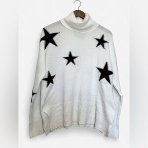 White Turtleneck Sweater with Black Stars